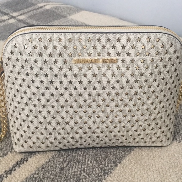 Michael Kors Handbags - Michael Kors perforated logo crossbody bag